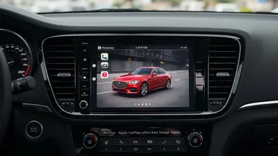 An Apple CarPlay screen displaying a personalized car image, highlighting easy customization options.