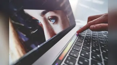 Retoucher photographer uses touchpad for adjustment color correction during retouching and editing photo